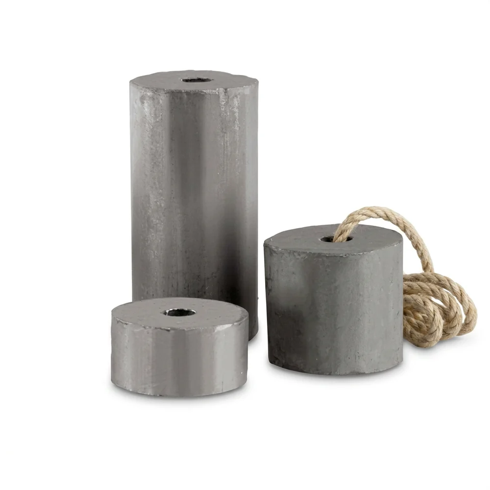 Three graduated cylindrical cast-lead sash window makeweights, each with a 10mm cord hole through the centre, one threaded with sash cord, on a white background